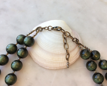 Green beads and brass necklace