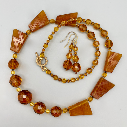 Necklace Set | 1930s Art Deco design trapezoids, 1920s graduated strand of sparkling faceted rounds