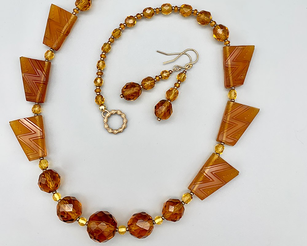 Necklace Set | 1930s Art Deco design trapezoids, 1920s graduated strand of sparkling faceted rounds