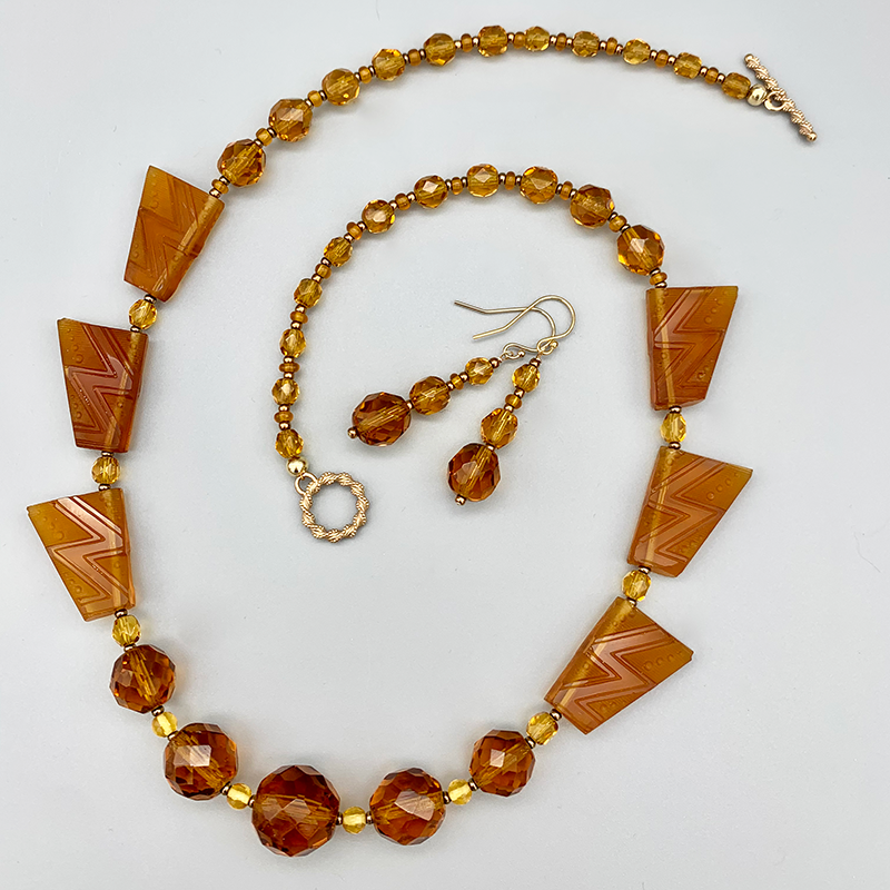 Necklace Set | 1930s Art Deco design trapezoids, 1920s graduated strand of sparkling faceted rounds