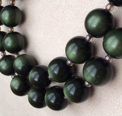 Green beads and brass necklace