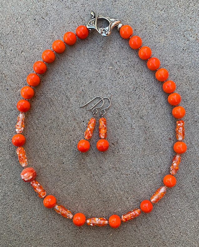 Necklace Set | Clear/orange/white baroque ovals and vivid orange vintage glass rounds