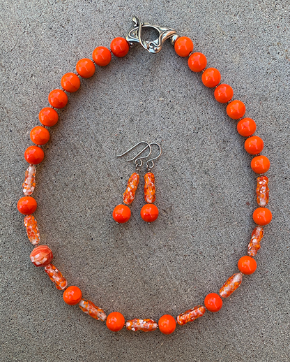 Necklace Set | Clear/orange/white baroque ovals and vivid orange vintage glass rounds