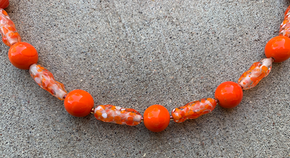 Necklace Set | Clear/orange/white baroque ovals and vivid orange vintage glass rounds