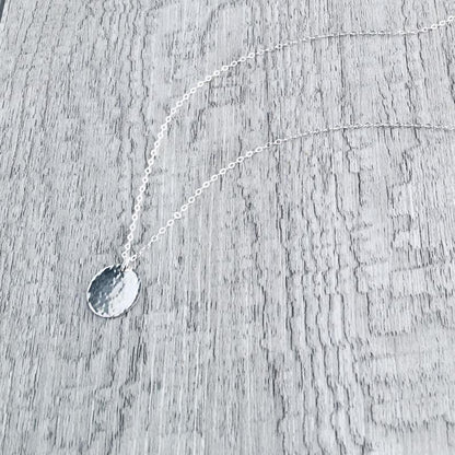 Classic hammered sterling silver disc necklace